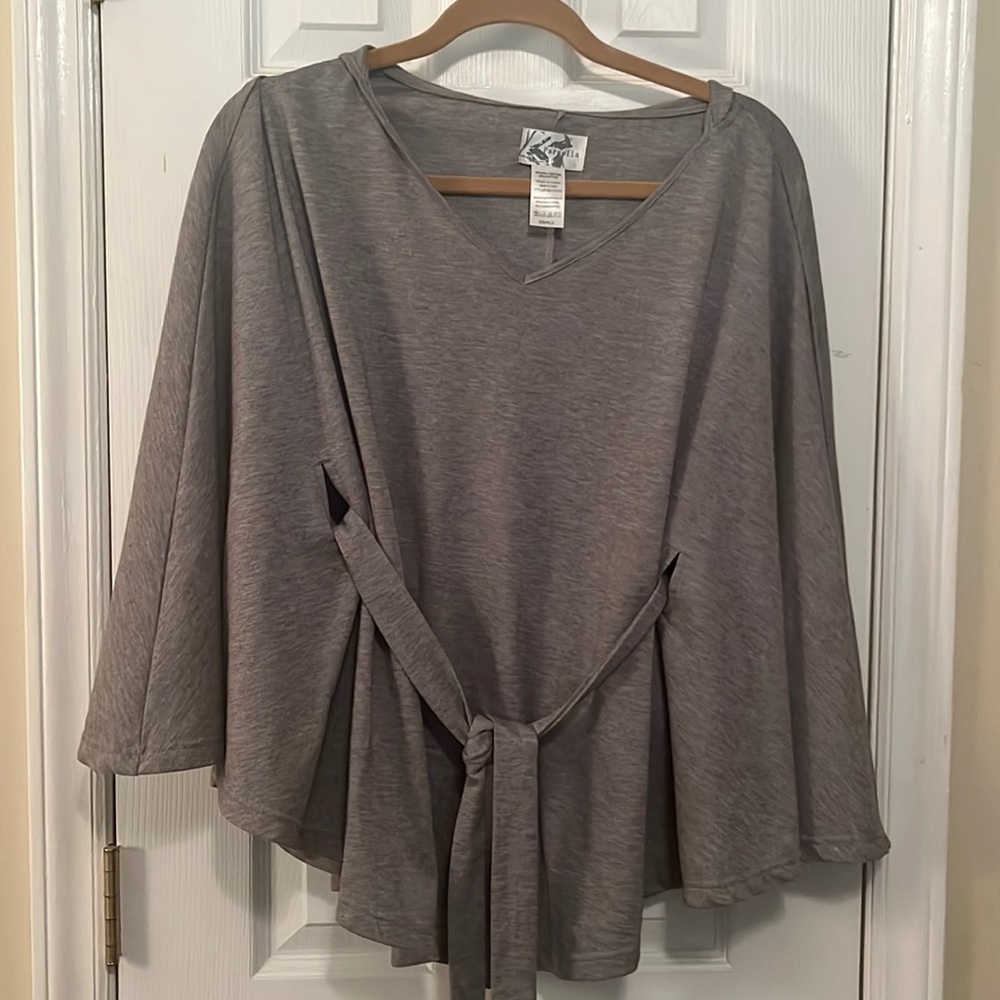 Hooded poncho.